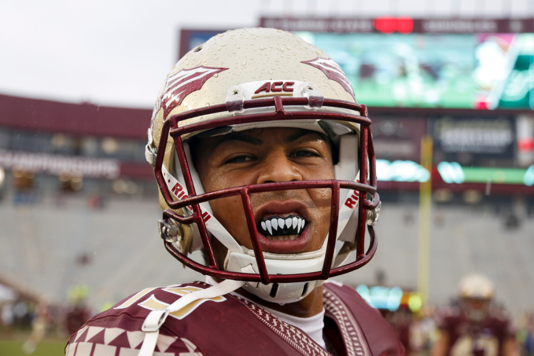 Kicker Roberto Aguayo #19 of the Florida State Seminoles shows off his mouth piece before the game against the South Florida Bulls at Doak Campbell Stadium on Bobby Bowden Field