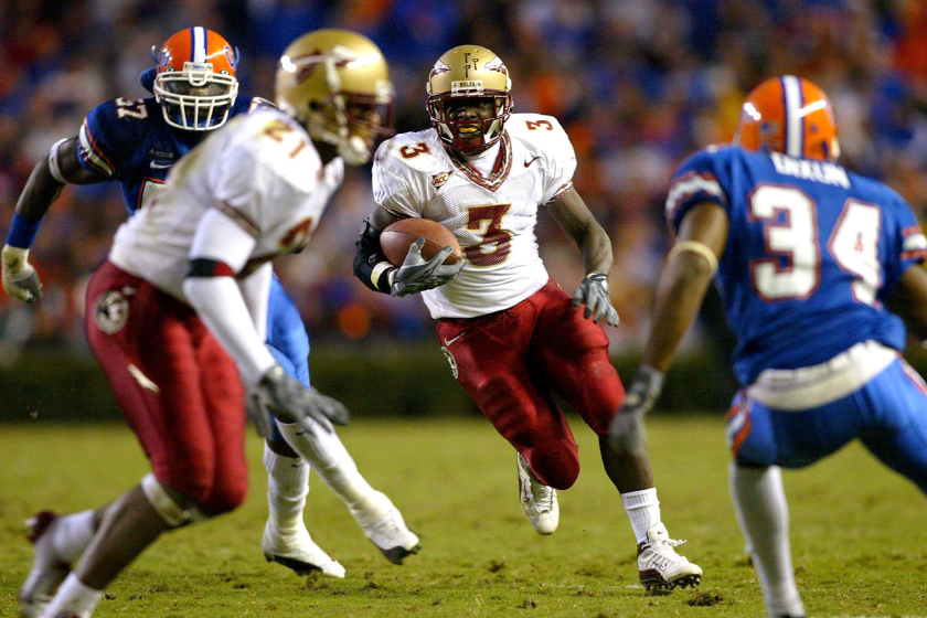 Running back Leon Washington carries the ball against Florida State.