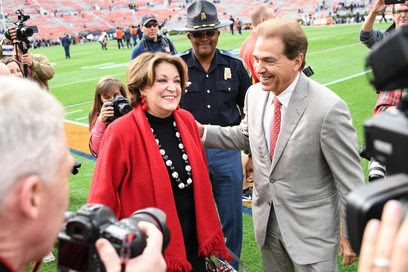 Head coach Nick Saban greets wife Terry on the sidelines prior to a football game between the Auburn Tigers and the Alabama Crimson Tide.