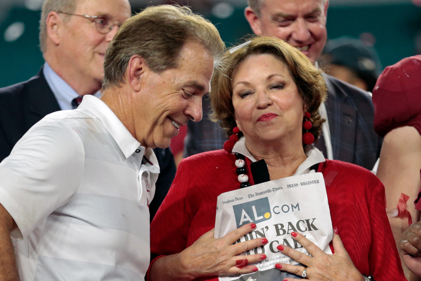 Head coach Nick Saban of the Alabama Crimson Tide celebrates the victory against the Oklahoma Sooners with his wife Terry Saban after the College Football Playoff Semifinal.