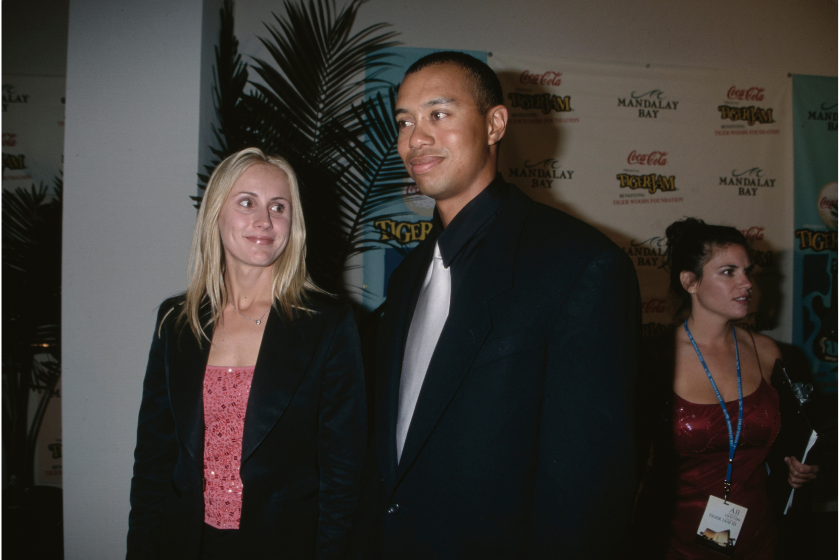 Tiger Woods and his girlfriend Joanna Jagoda attend a charity event in 2000.