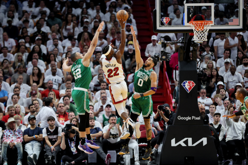 Jimmy Butler drives the lane against the Boston Celtics.