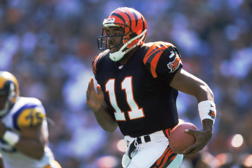 Akili Smith runs with the ball during a Cincinnati Bengals game.