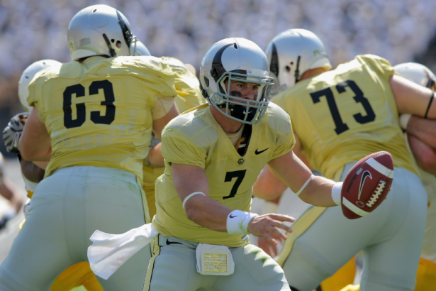 Colorado QB Cody Hawkins hands the ball off during a 2009 game.