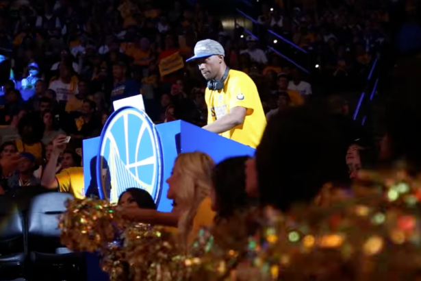 DJ D Sharp plays at a Golden State Warriors game in 2015.
