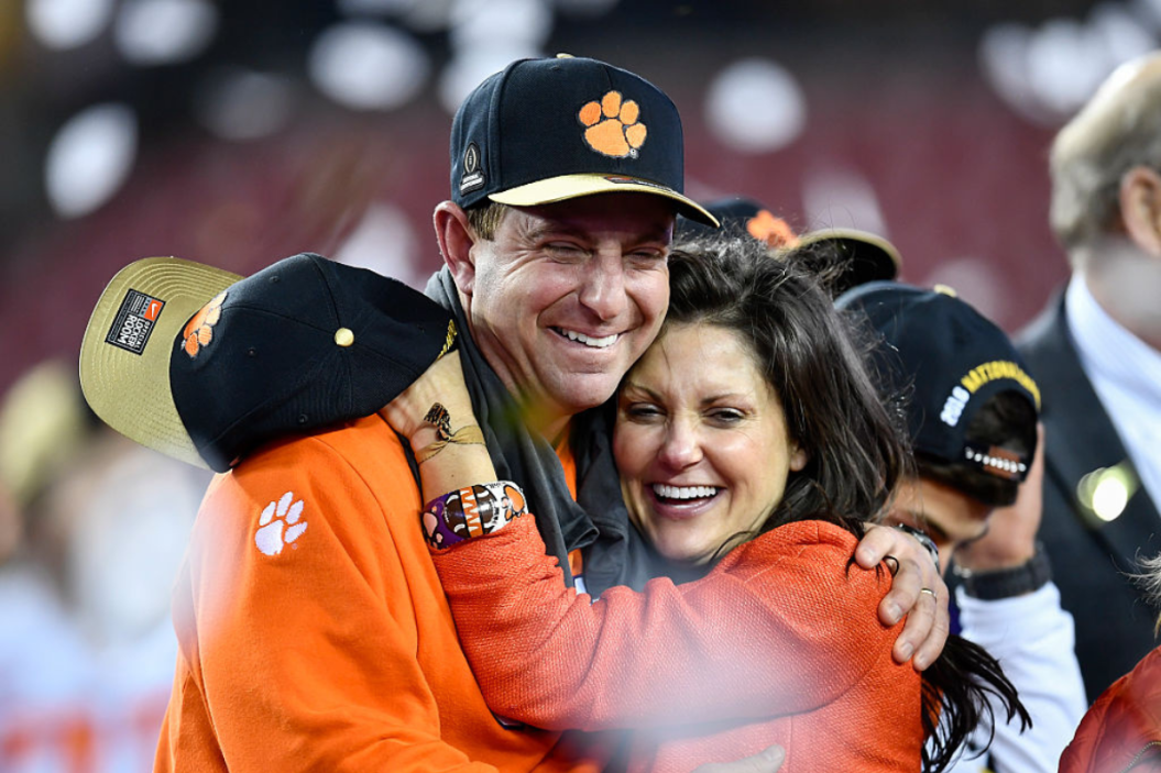 Clemson University head coach Dabo Swinney shares a special moment with his wife Kathleen during the award ceremony after the second half of the CFP National Championship game