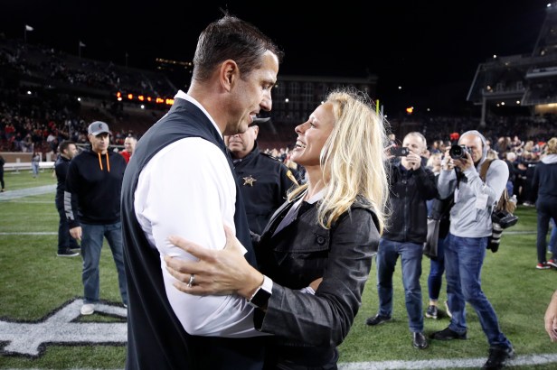 Luke Fickell Embraces His Wife Amy