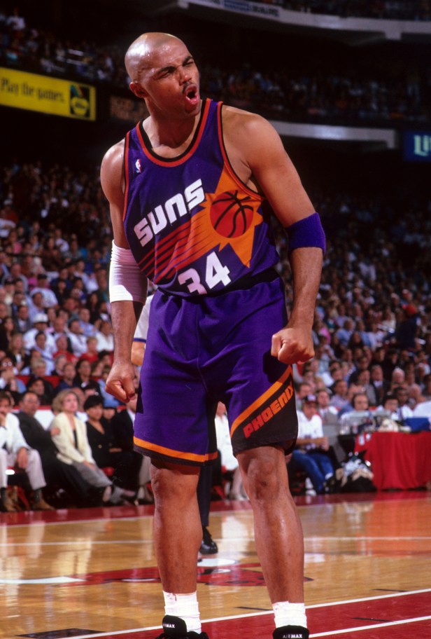 Phoenix Suns superstar Charles Barkley celebrates after a big play against the Chicago Bulls.