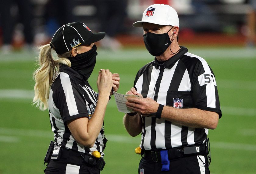 Sara Thomas and Carl Cheffers speak during Super Bowl LV.