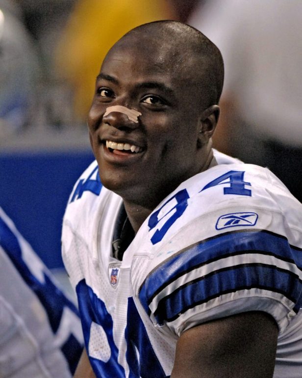DeMarcus Ware smiles during a game with the Dallas Cowboys.