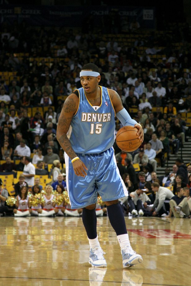 Denver Nuggets forward Carmelo Anthony dribbles and weighs his attack options.