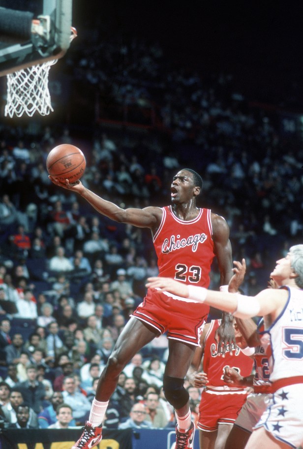 Chicago Bulls superstar Michael Jordan shoots a layup agains the Washington Bullets.