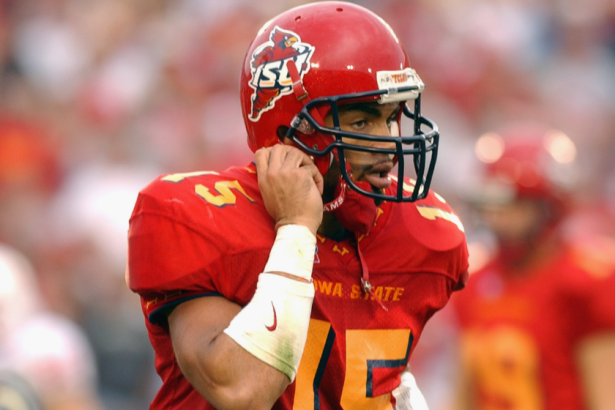 Seneca Wallace unstraps his helmet during the 2002 Big 12 Conference Championship game. 