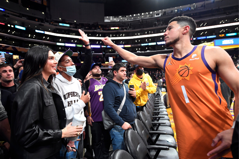 Devin Booker meets with Kendall Jenner's friends after a Suns/Lakers game. 
