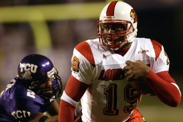 Cardinals running back Michael Bush runs with the ball against TCU in 2003.