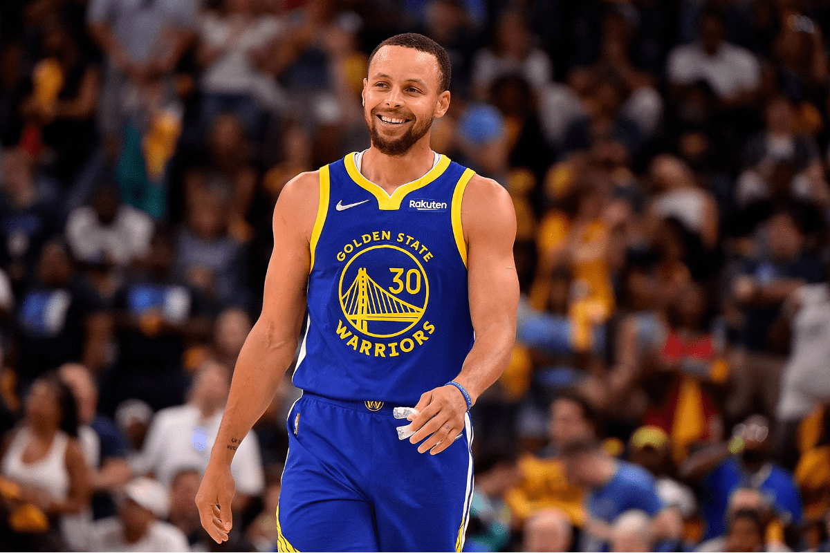 Golden State Warriors guard Steph Curry smiles after game one of the Western Conference semifinals against the Memphis Grizzlies.