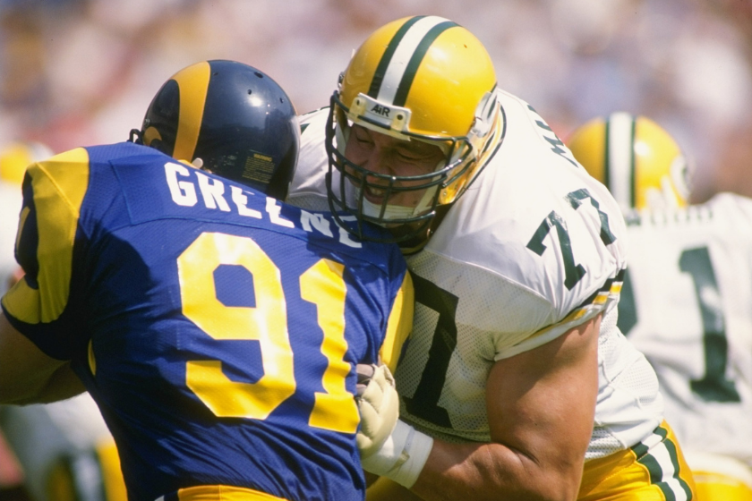 Tony Mandarich lays a block on a Rams defensive lineman.