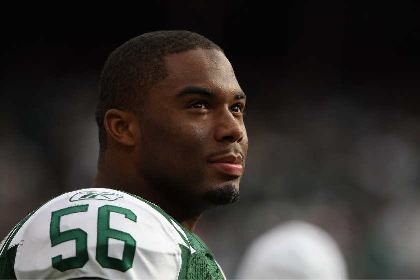 Vernon Gholston looks on from the Jets sideline