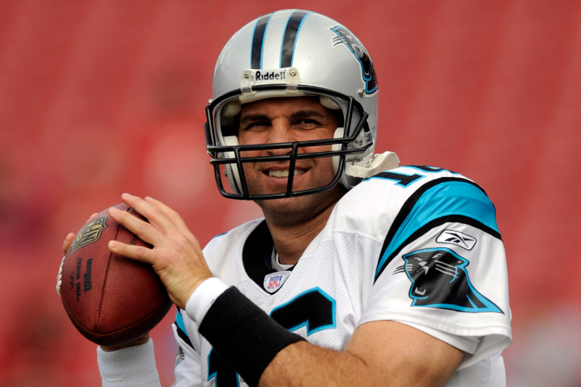 Quarterback Vinny Testaverde of the Carolina Panthers warms up before play against the Tampa Bay Buccaneers at Raymond James Stadium