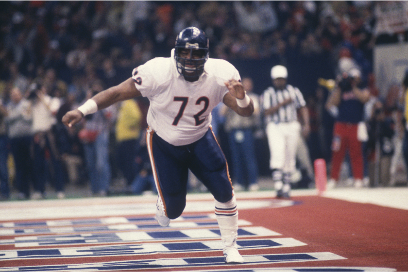 Chicago Bears defensive lineman William "The Refrigerator" Perry rumbles against the New England Patriots in Super Bowl XX.