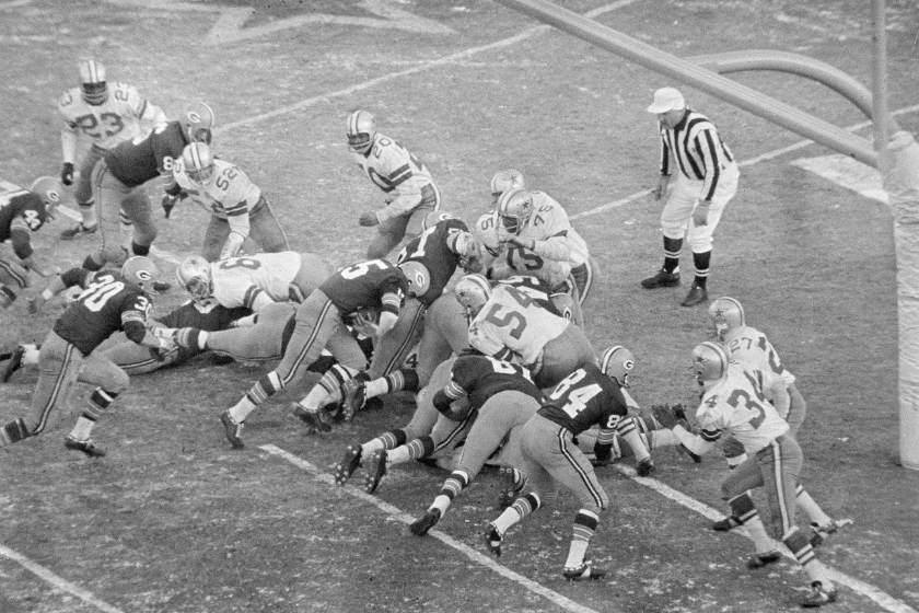 Packers quarterback Bart Starr sneaks into the end zone to secure a berth in Super Bowl II.