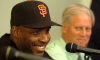 Barry Bonds smiles during his signing ceremony with the Giants.
