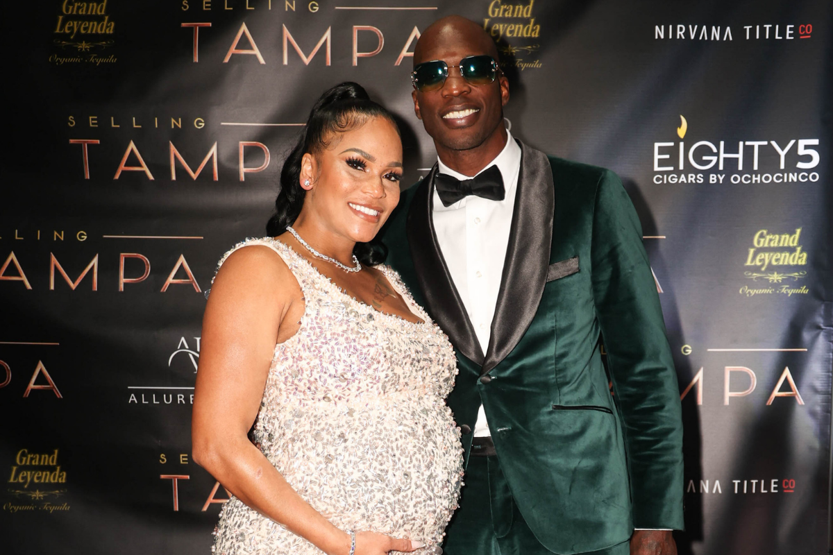 Chad Johnson with fiancee Sharelle Rosado at Selling Tampa premiere