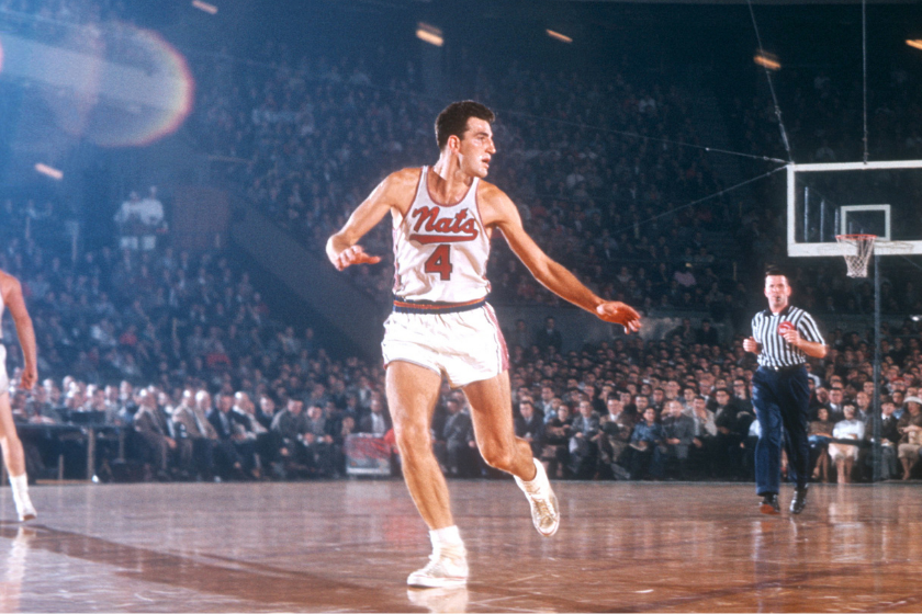 Dolph Hayes defends against the Boston Celtics.