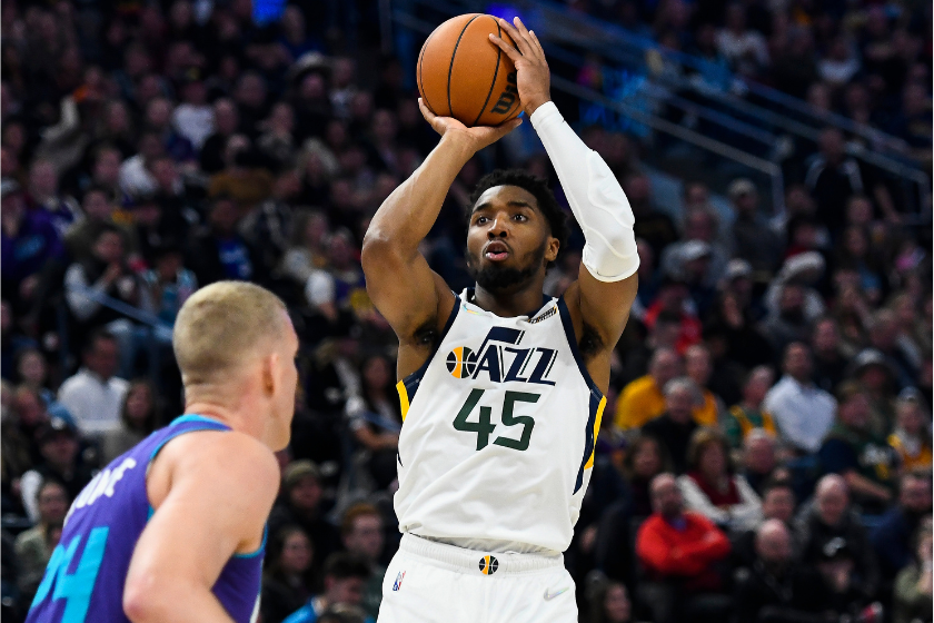 Donovan Mitchell rises to shoot against the Charlotte Hornets.