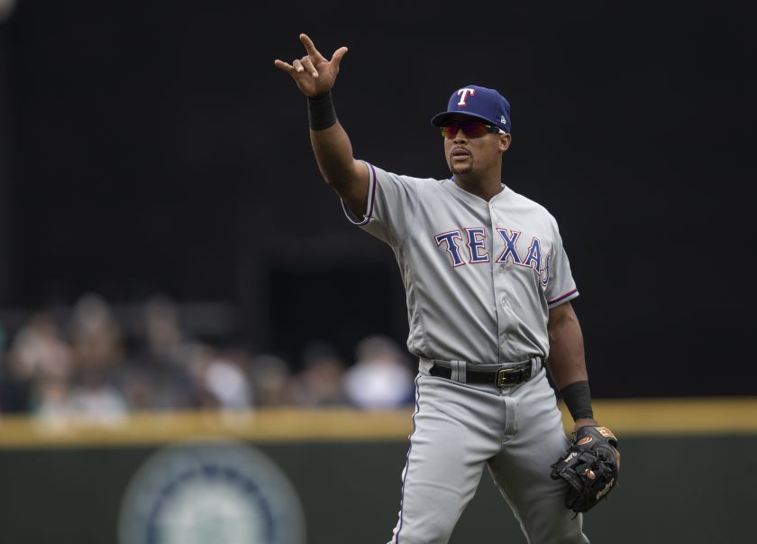 Adrian Beltre puts his hand up during a game with the Texas Rangers.