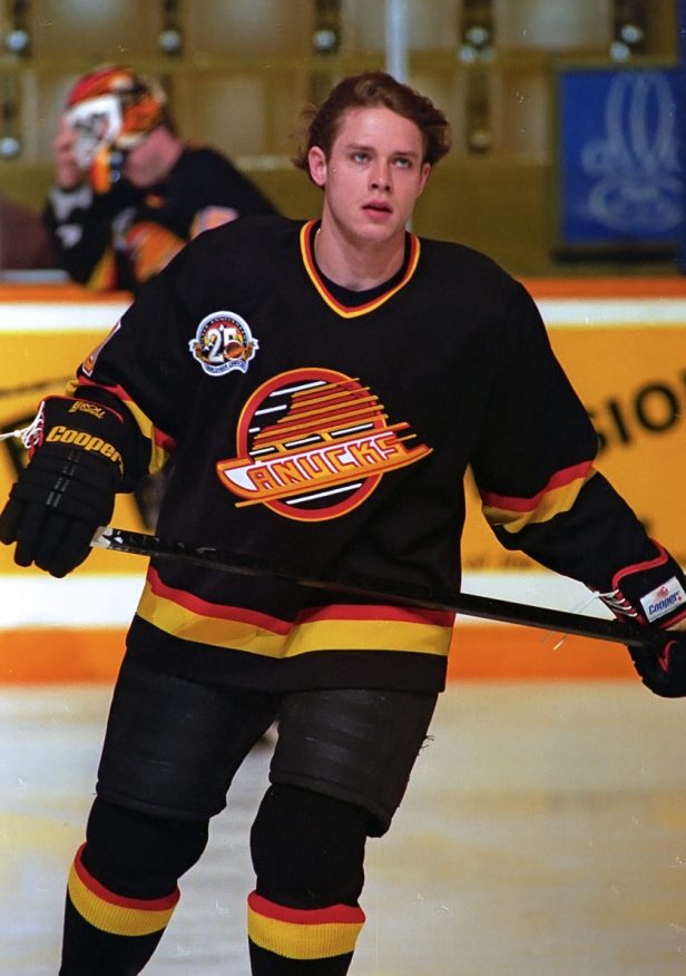 A Vancouver Canucks player skates during a game.