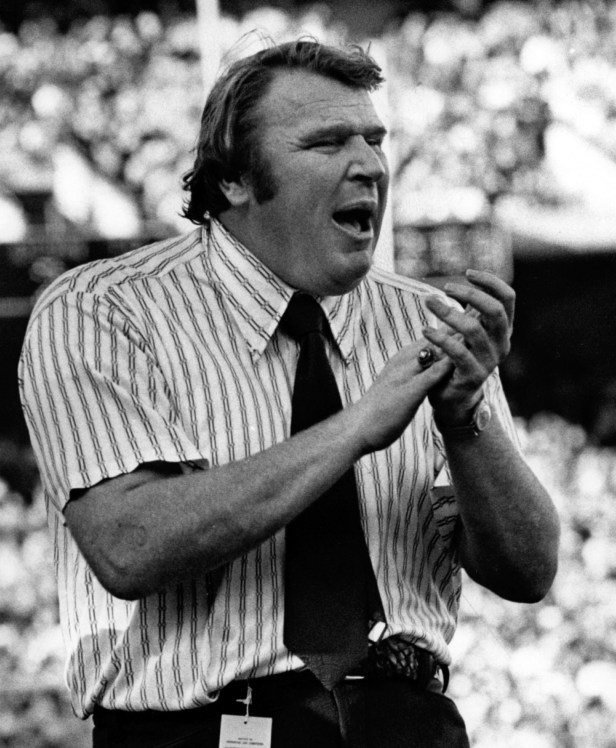 Oakland Raiders coach John Madden leads his team against the Cincinnati Bengals.