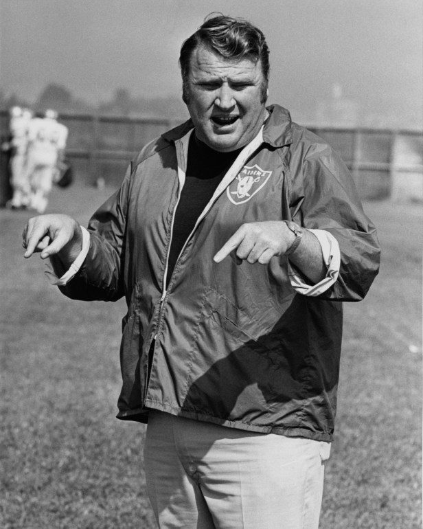 Oakland Raiders head coach John Madden coaches his team before a game against the Denver Broncos.