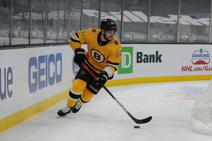 A Boston Bruins player skates during a game.