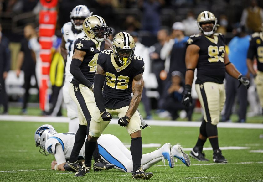 New Orleans Saints defensive back Chauncey Gardner-Johnson flexes after making a play.