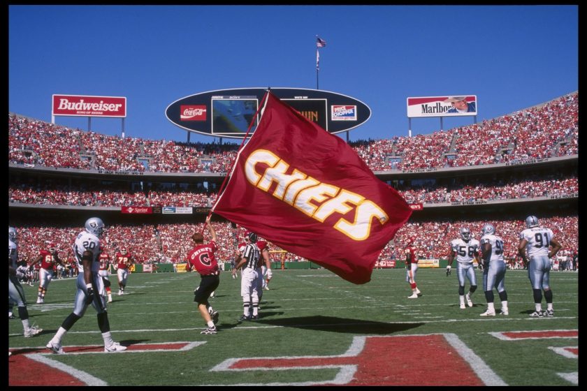 Kansas City Chiefs fan waves a flag before a game against the Oakland Raiders held at Arrowhead Stadium in 1995.