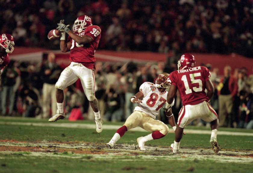 An Oklahoma player jumps for the ball during the 2001 BCS National Championship Game.