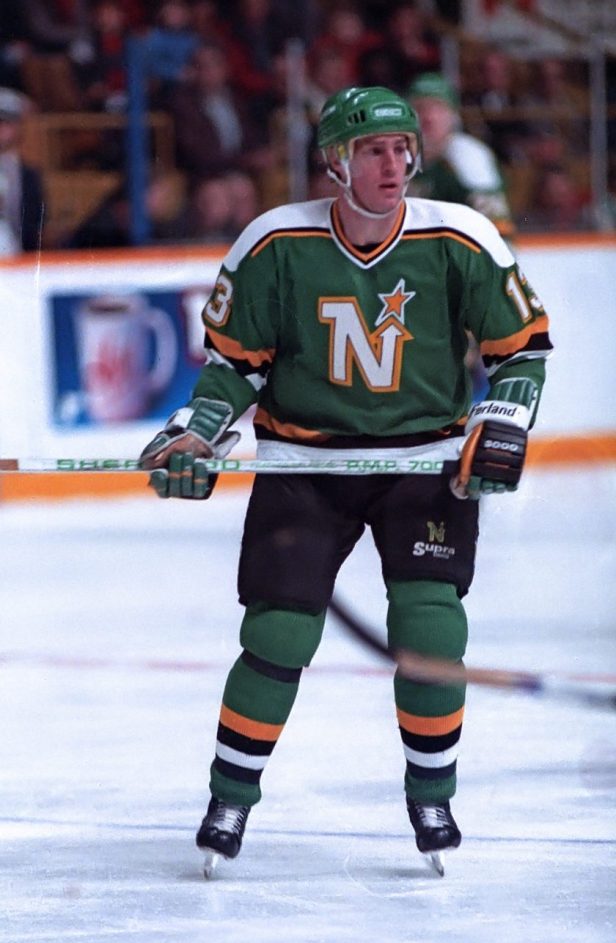 A Minnesota North Stars player skates during a game.