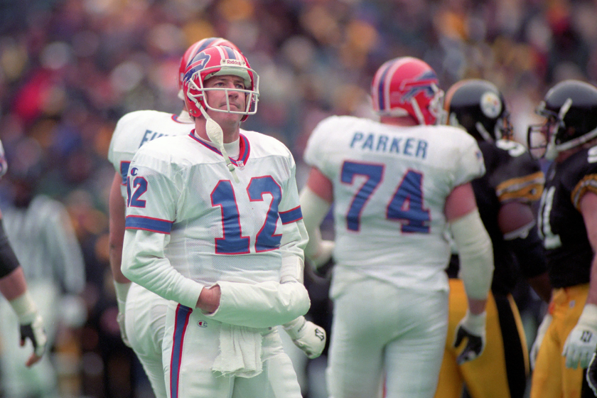Buffalo Bills quarterback Jim Kelly looks dejected against the Pittsburgh Steelers.