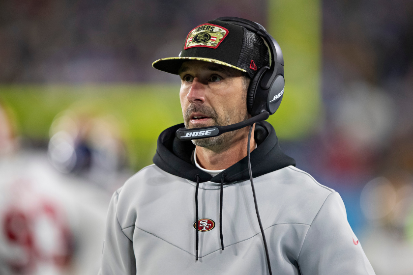Kyle Shanahan looks at the scoreboard as the San Francisco 49ers take on the Tennessee Titans.