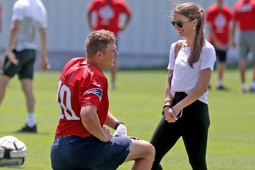Mac Jones of there New England Patriots with his girlfriend Sophie Scott during training camp