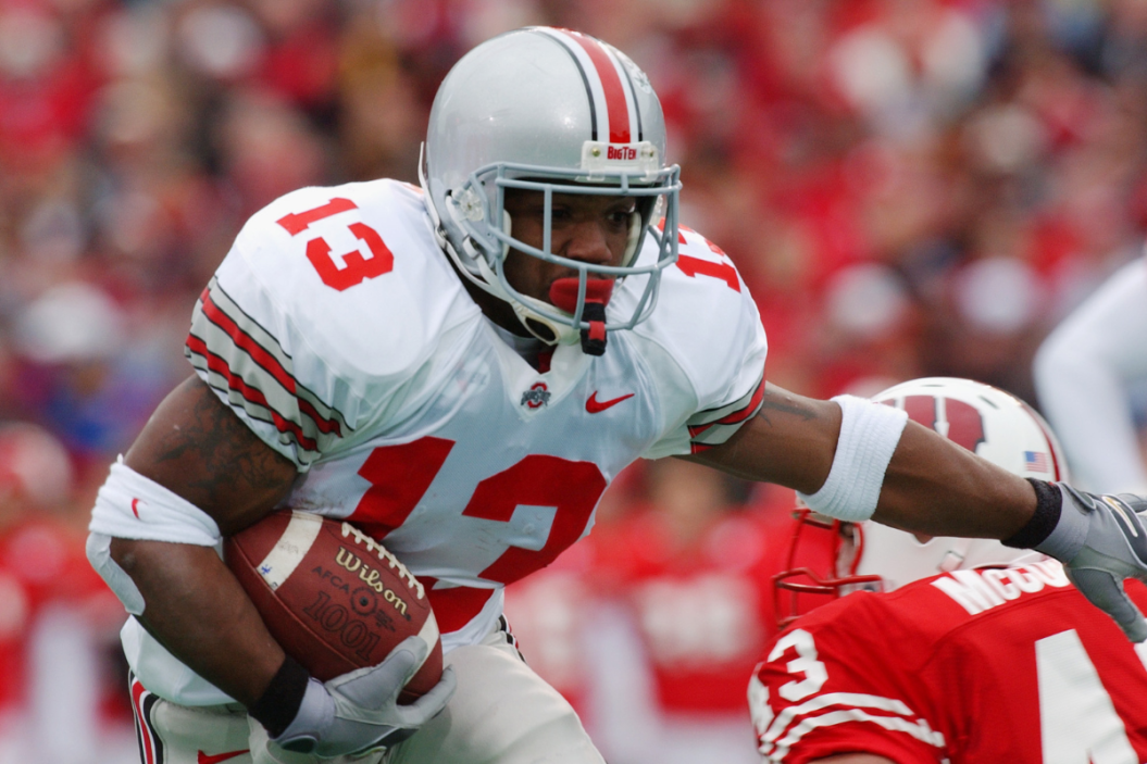 Tailback Maurice Clarett #13 of Ohio State looks for running room during the NCAA football game against Wisconsin at Camp Randall Stadium
