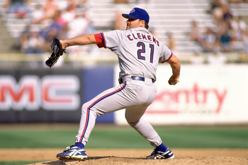 Roger Clemens #21 of the Toronto Blue Jays throws a pitch during a game from his 1997 season with the Toronto Blue Jays. Roger Clemens played for 24 years, with 4 different team,was a 11-time All-Star, a 7-time Cy Young Award winner 