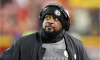 Pittsburgh Steelers head coach Mike Tomlin looks up from the sidelines against the Kansas City Chiefs.
