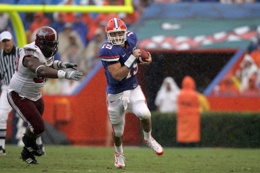 Florida quarterback Tim Tebow runs against Troy in the rain.