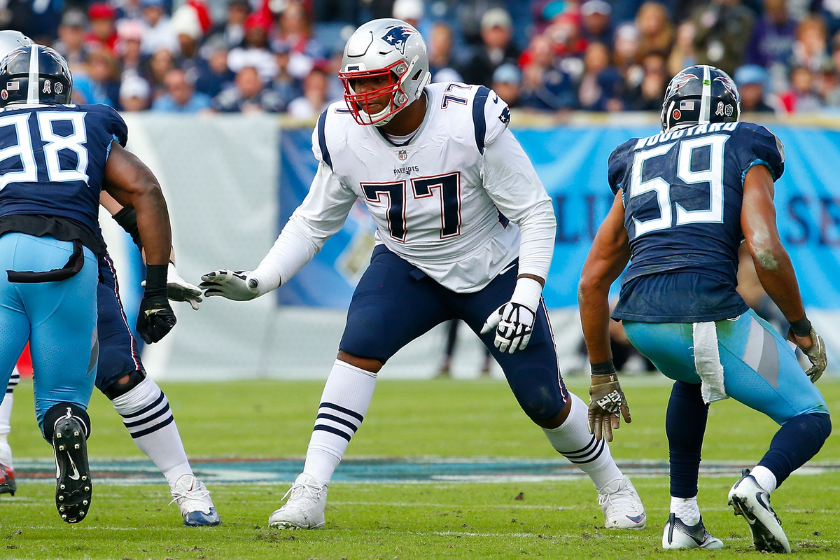 Trent Brown #77 of the New England Patriots blocks against the Tennessee Titans