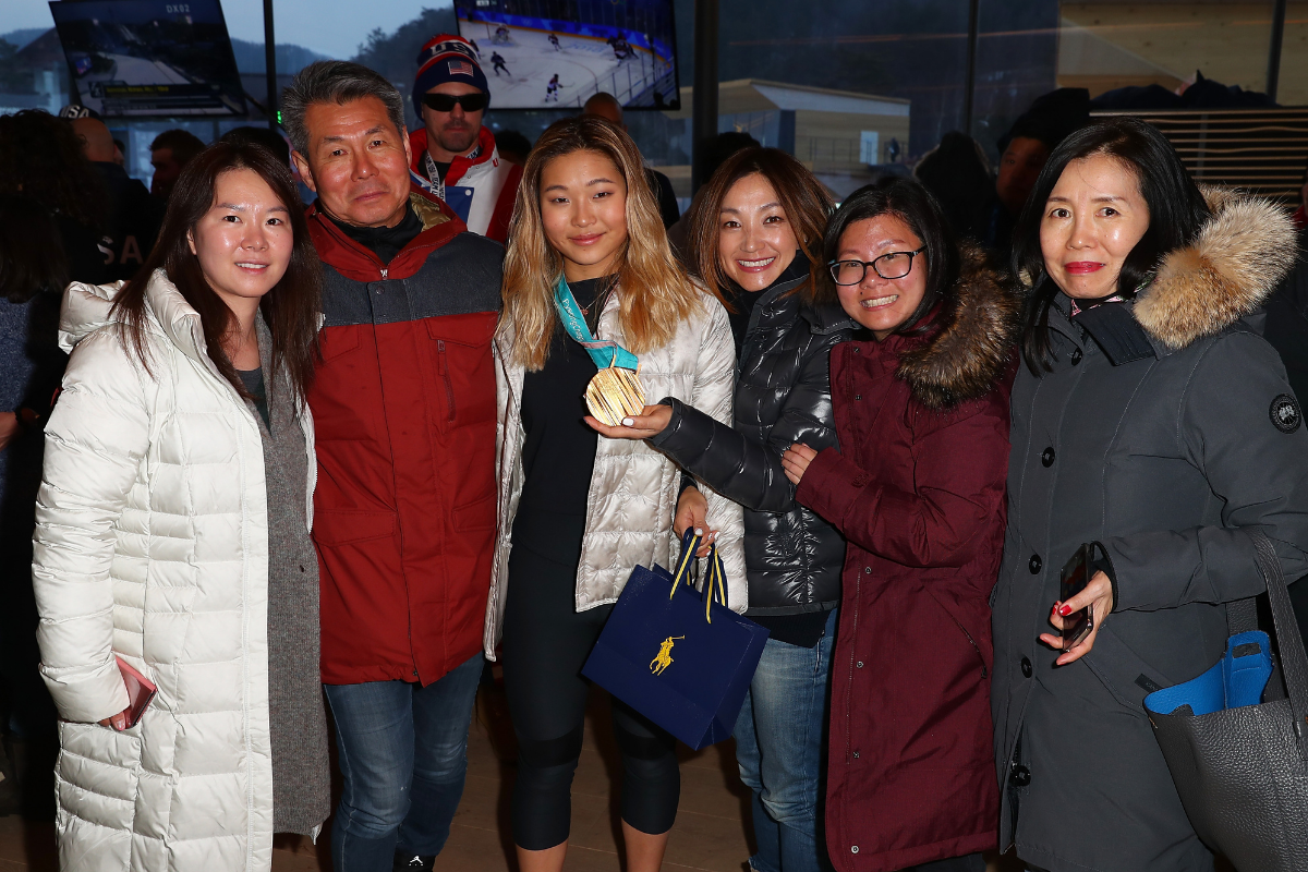 Chloe Kim and her family celebrate her gold medal at the 2018 PyeongChang Winter Olympics.