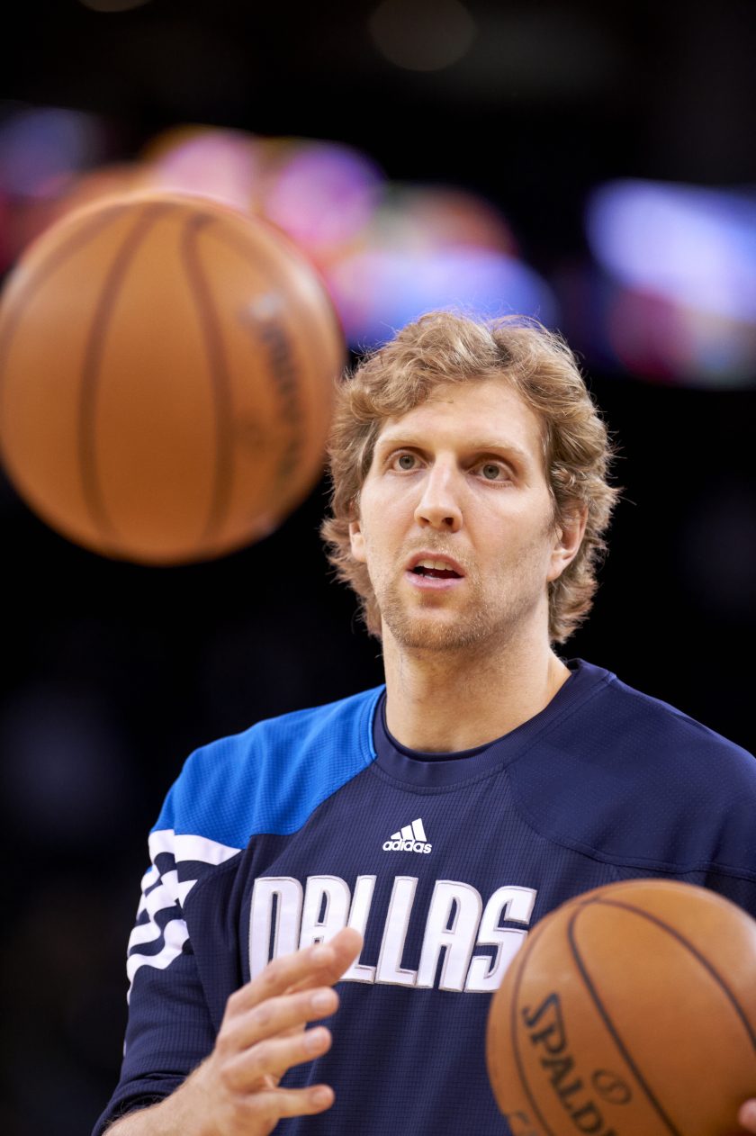 Dirk Nowitzki warms up before a NBA game.