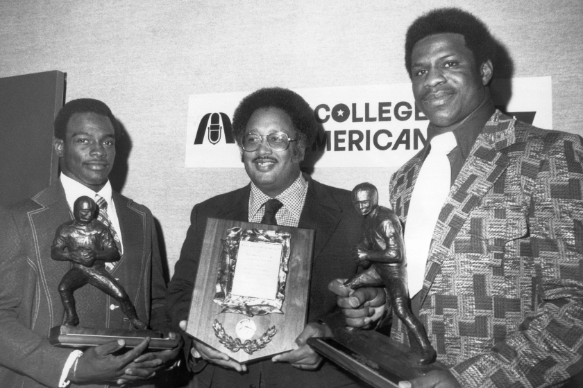 Marino Casem (center) wins Black College Coach of the Year in 1974.