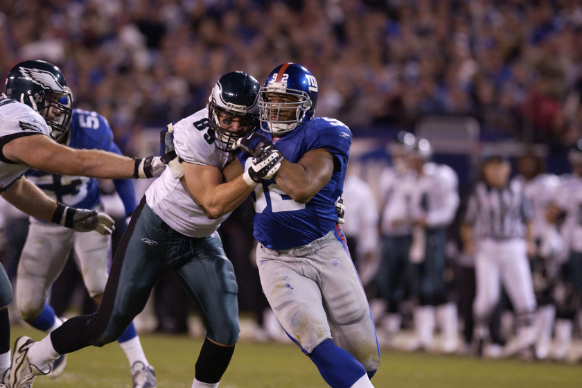 Michael Strahan rushes the quarterback against the Philadelphia Eagles.